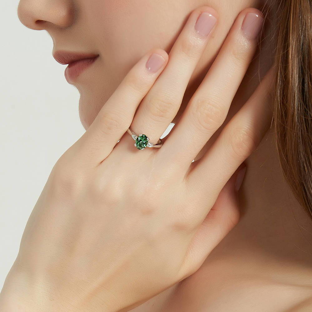 Model wearing 3-Stone Green Oval CZ Ring in Sterling Silver, 6 of 9