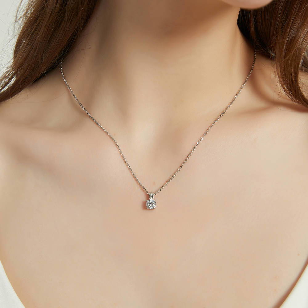 Model wearing Solitaire 0.8ct Round CZ Pendant Necklace in Sterling Silver