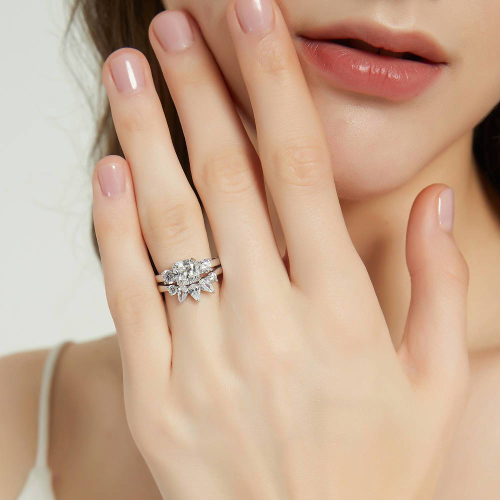 Model wearing 3-Stone Wishbone Cushion CZ Ring Set in Sterling Silver