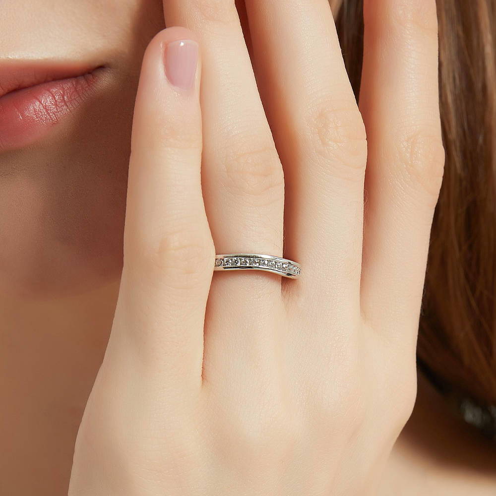 Model wearing Channel Set CZ Curved Half Eternity Ring in Sterling Silver