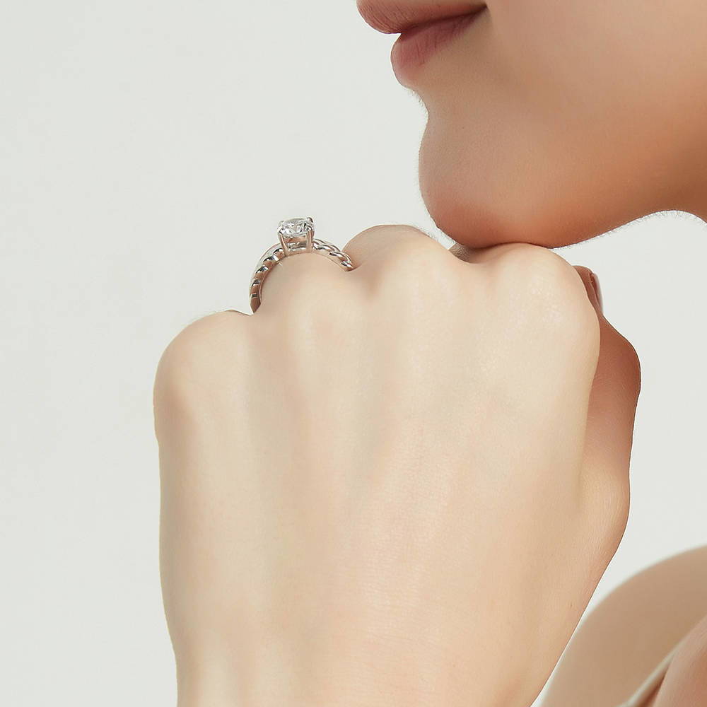 Model wearing Woven Solitaire CZ Ring in Sterling Silver