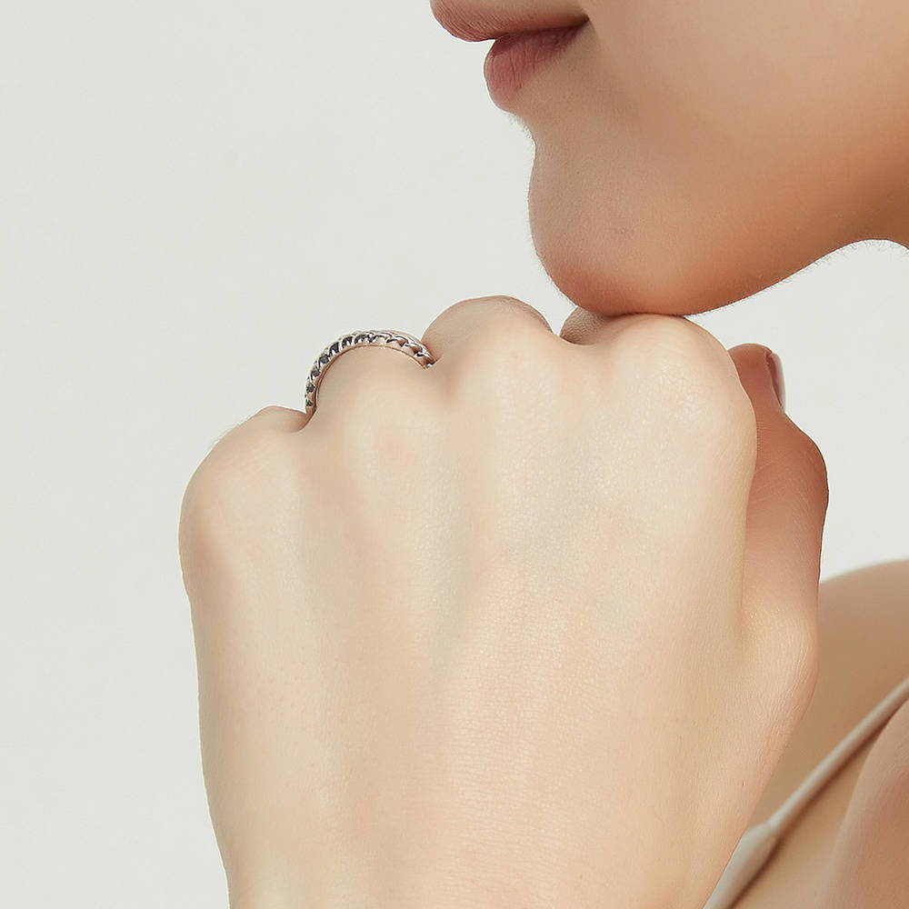 Model wearing Woven Curved Band in Sterling Silver