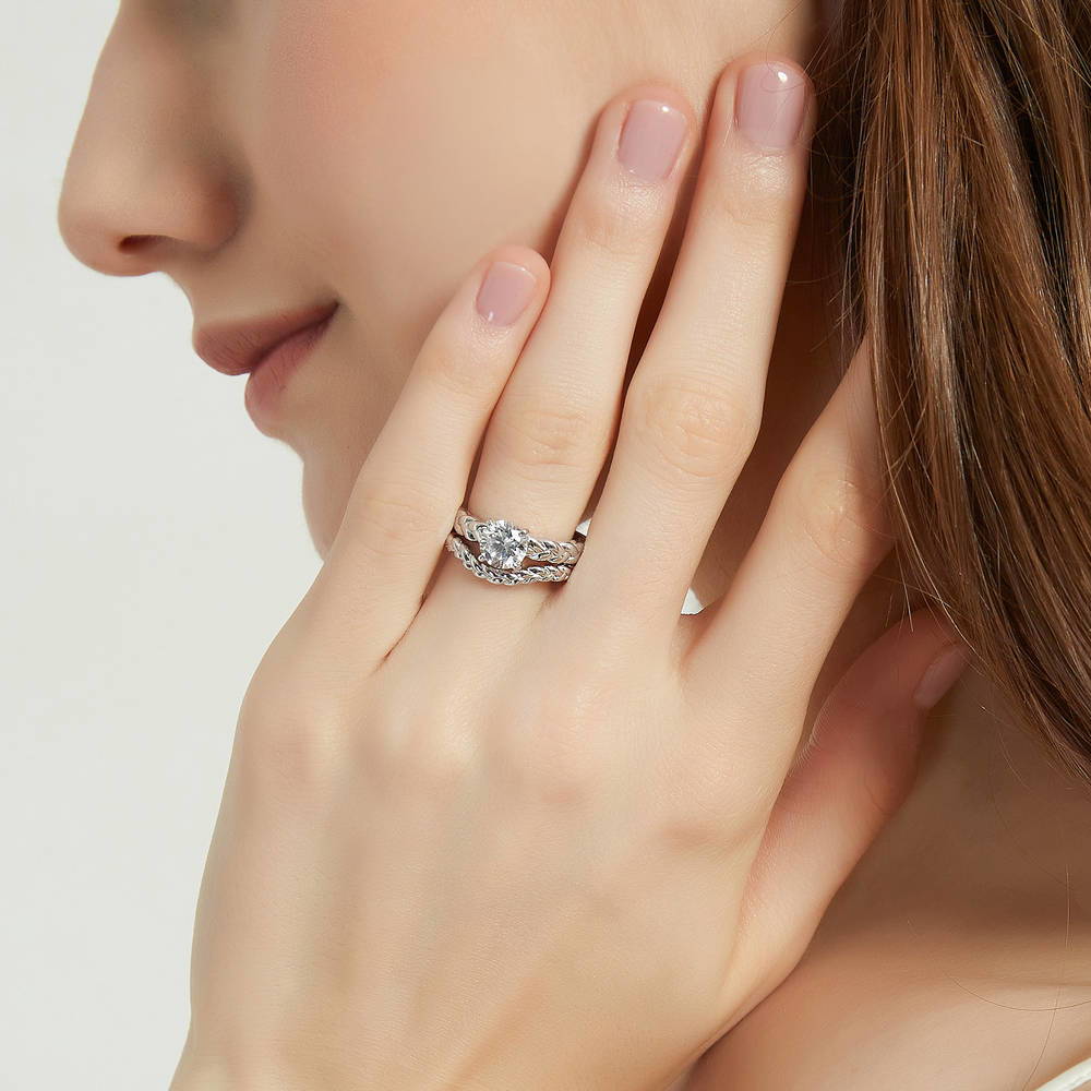 Model wearing Solitaire Woven 1.25ct Round CZ Ring Set in Sterling Silver