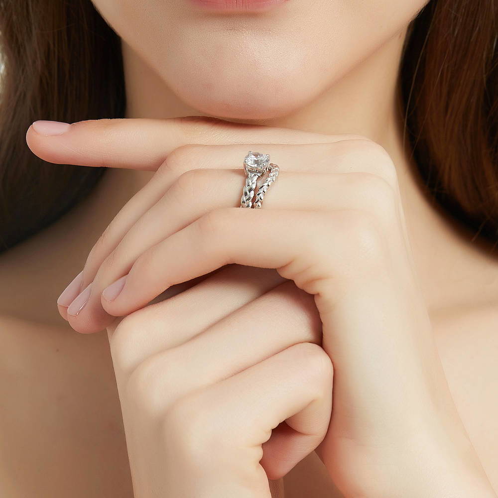 Model wearing Solitaire Woven 1.25ct Round CZ Ring Set in Sterling Silver