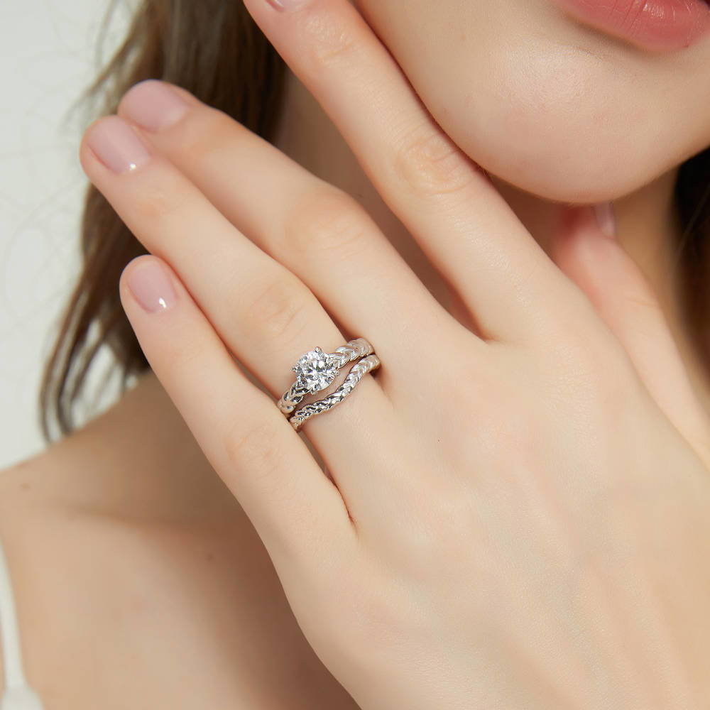 Model wearing Solitaire Woven 1.25ct Round CZ Ring Set in Sterling Silver