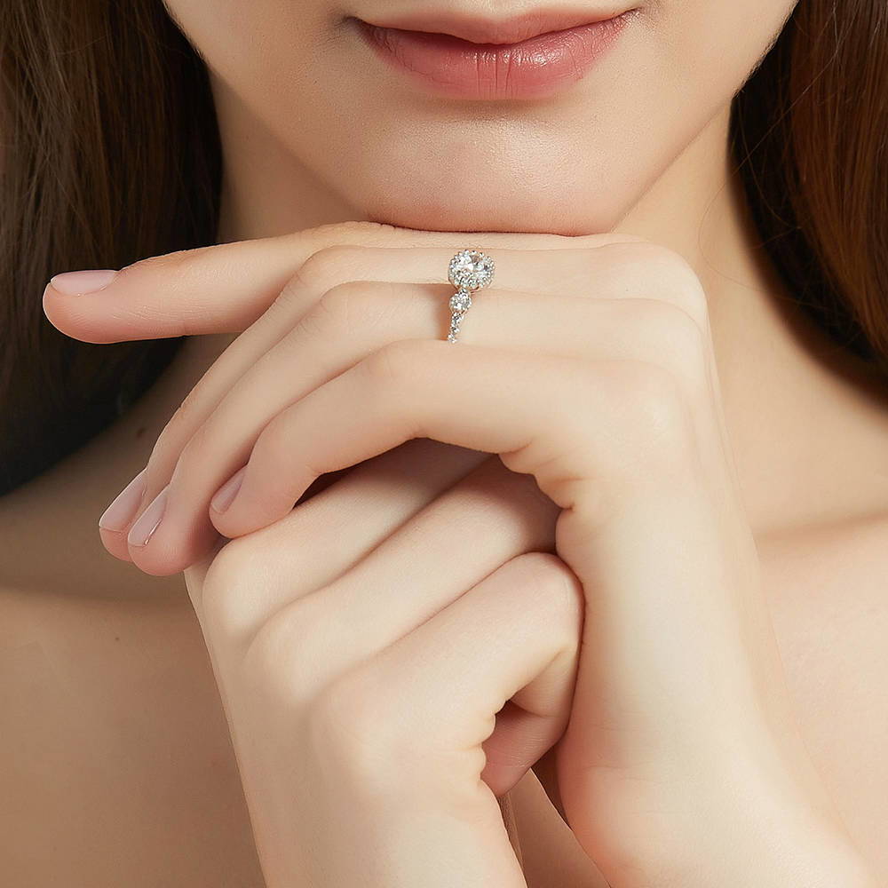 Model wearing 3-Stone Oval CZ Ring in Sterling Silver