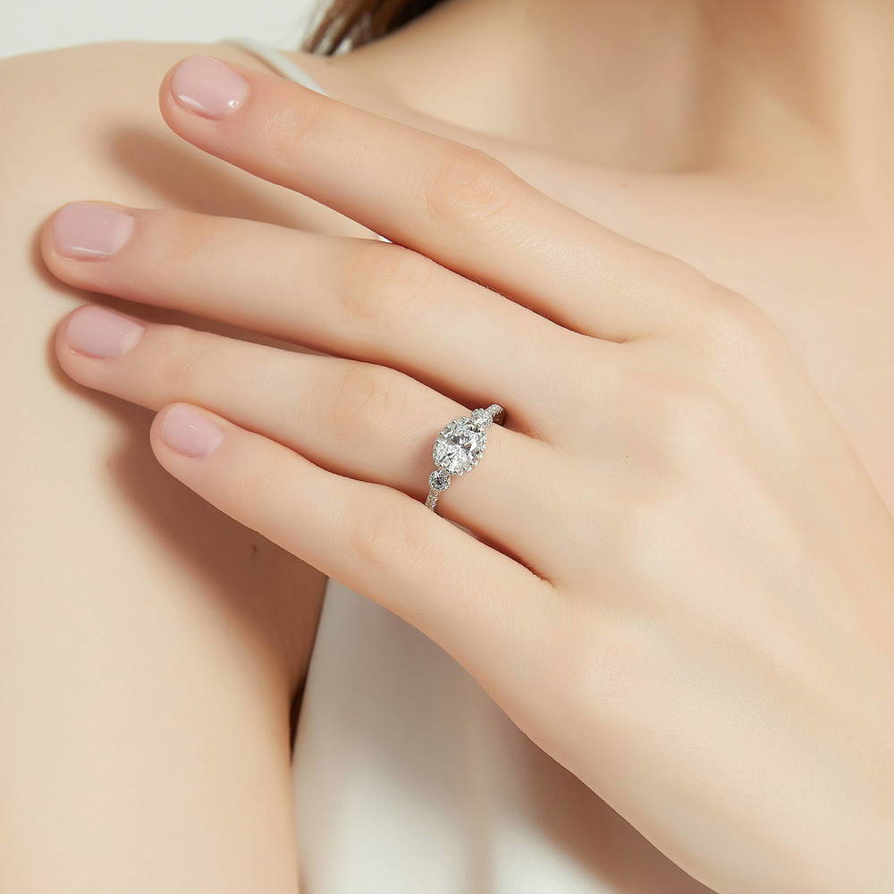 Model wearing 3-Stone Oval CZ Ring in Sterling Silver