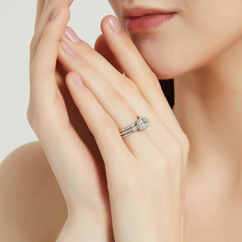 Model wearing 3-Stone Oval CZ Ring Set in Sterling Silver