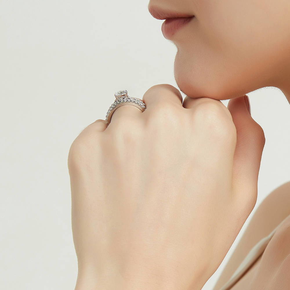 Model wearing Solitaire 0.8ct Round CZ Ring Set in Sterling Silver