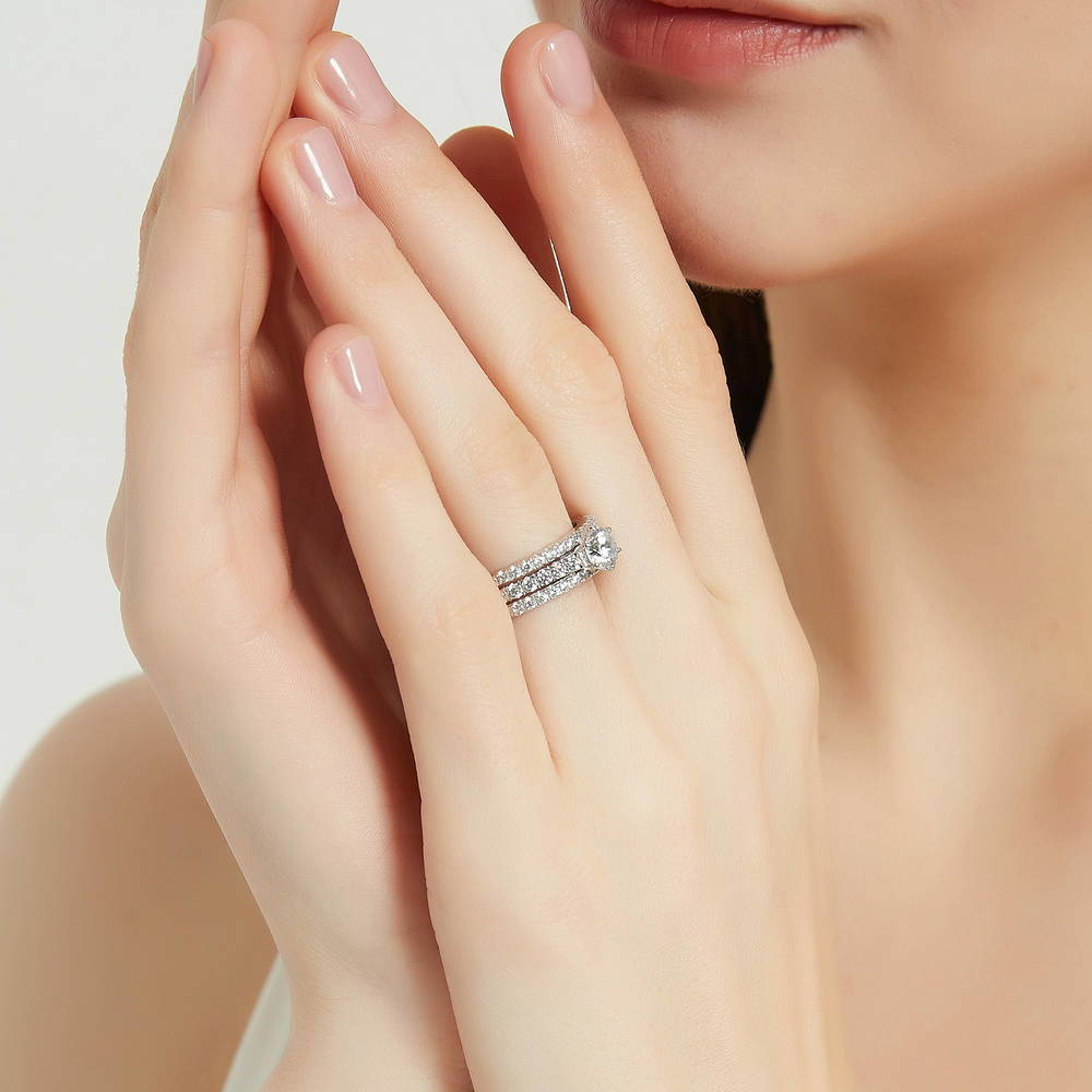 Model wearing Solitaire 0.8ct Round CZ Ring Set in Sterling Silver