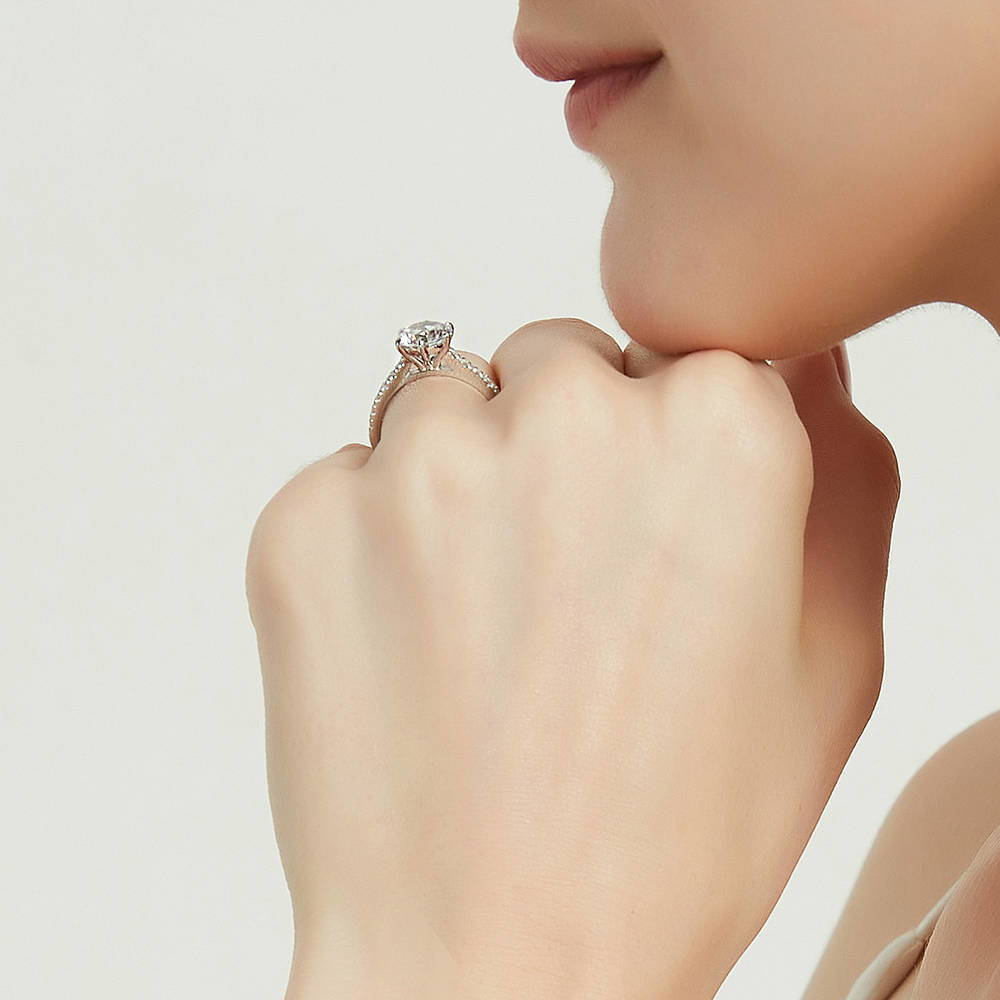 Model wearing Solitaire 2ct Round CZ Ring in Sterling Silver