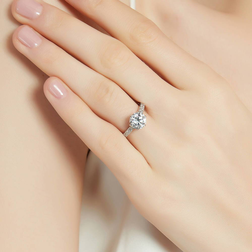 Model wearing Solitaire 2ct Round CZ Ring Set in Sterling Silver, 9 of 14