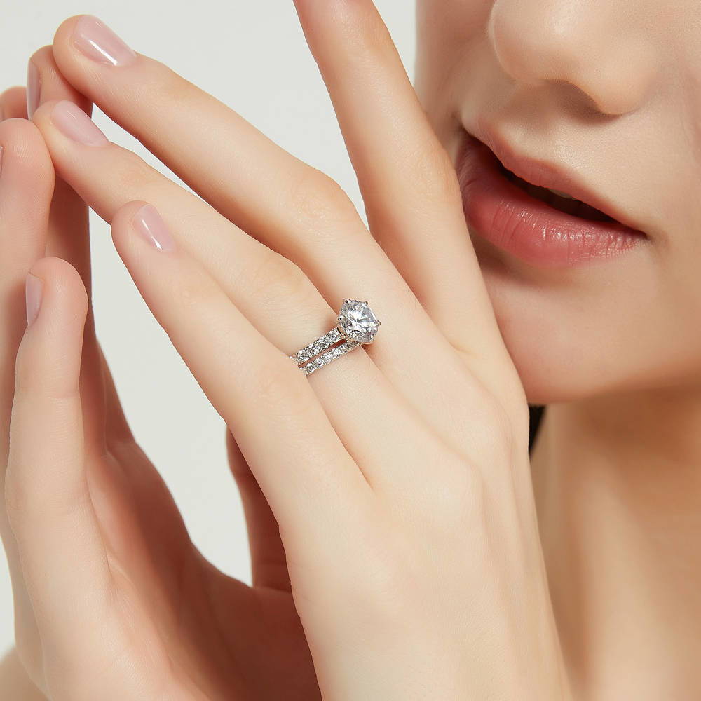 Model wearing Solitaire 2ct Round CZ Ring Set in Sterling Silver