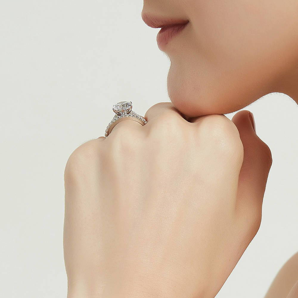 Model wearing Solitaire 2.7ct Round CZ Ring Set in Sterling Silver