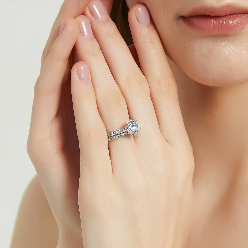 Model wearing Solitaire 2.7ct Round CZ Ring Set in Sterling Silver