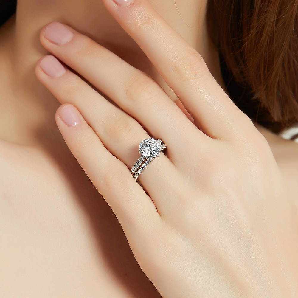 Model wearing Solitaire 2.7ct Round CZ Ring Set in Sterling Silver