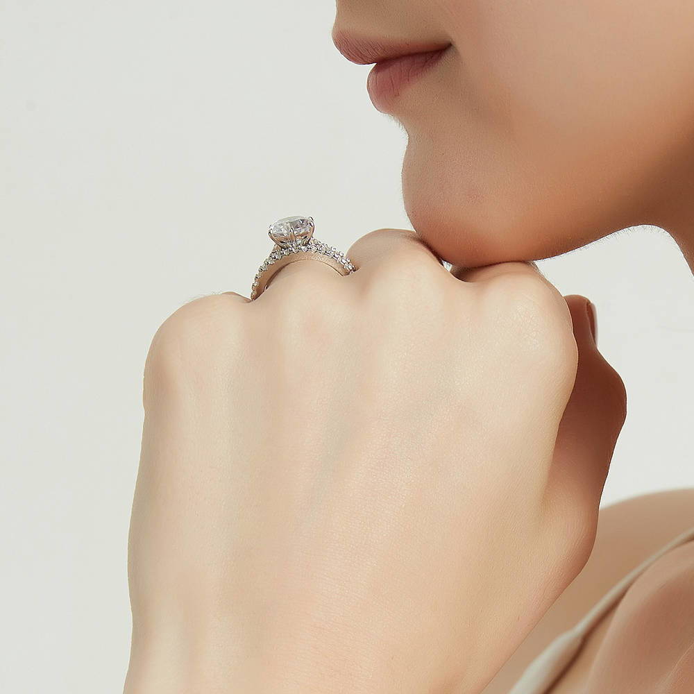 Model wearing Solitaire 2.7ct Round CZ Ring Set in Sterling Silver