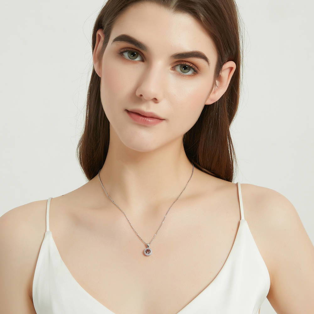Model wearing Halo Caramel Round CZ Pendant Necklace in Sterling Silver, 5 of 9