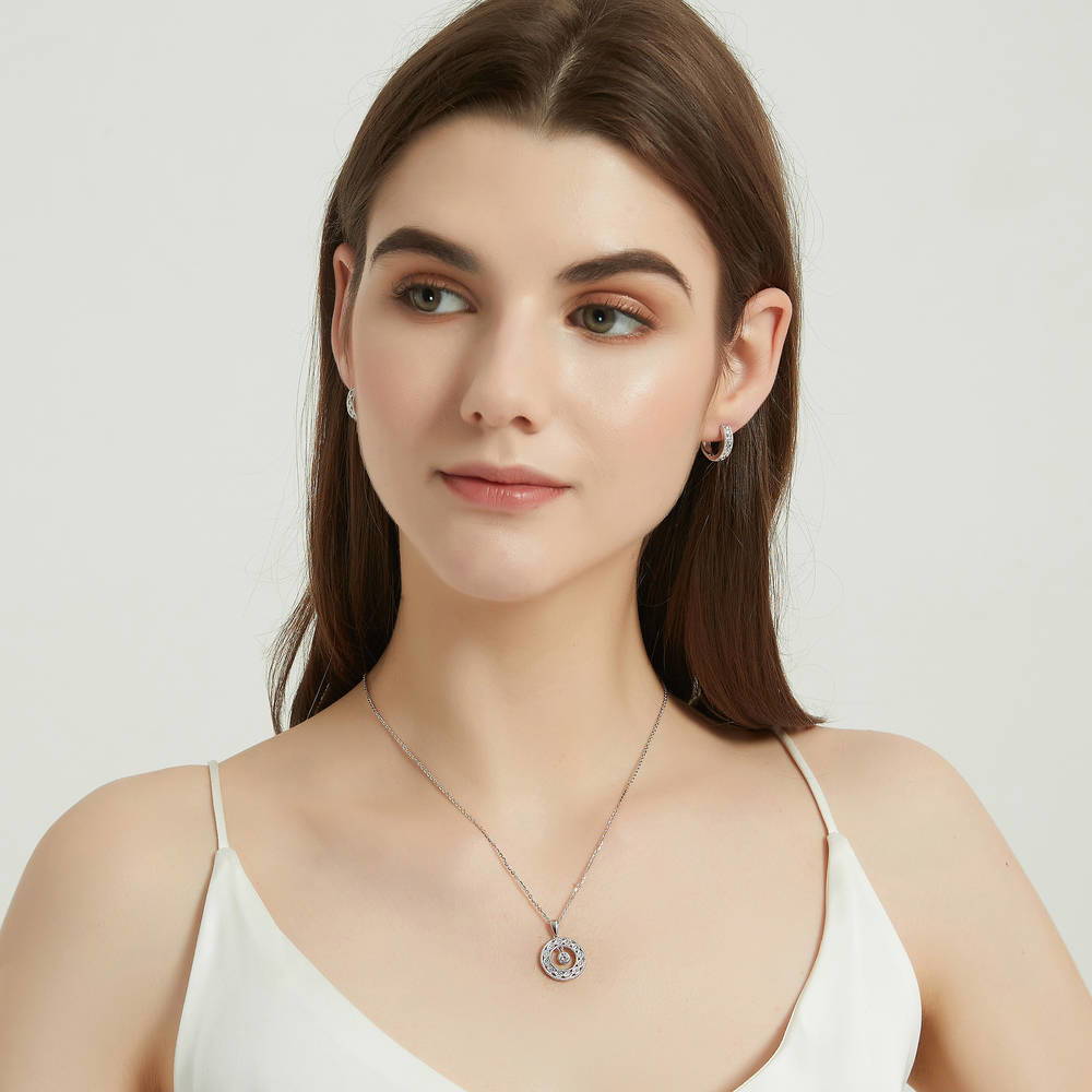 Model wearing Woven CZ Medium Hoop Earrings in Sterling Silver 0.63 inch