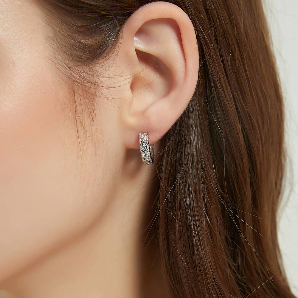 Model wearing Woven CZ Medium Hoop Earrings in Sterling Silver 0.63 inch