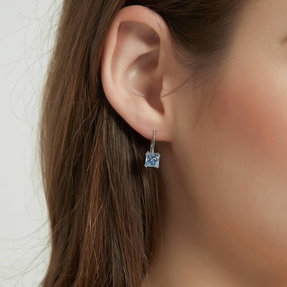 Model wearing Solitaire Princess CZ Leverback Earrings in Sterling Silver 2.4ct