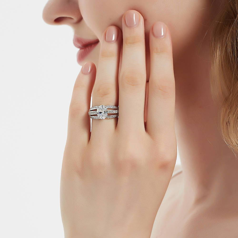Model wearing Solitaire 1.8ct Oval CZ Ring in Sterling Silver, 2 of 9