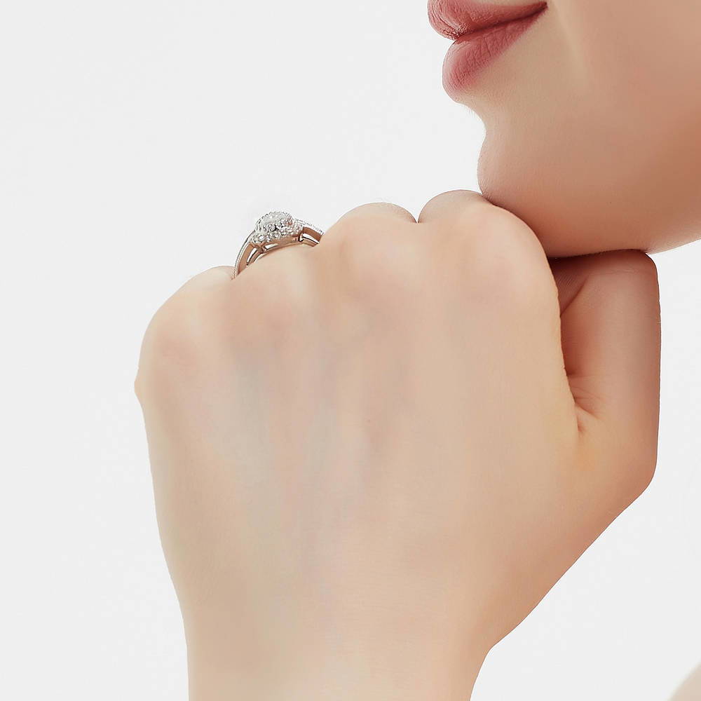 Model wearing Halo Milgrain Pear CZ Ring in Sterling Silver