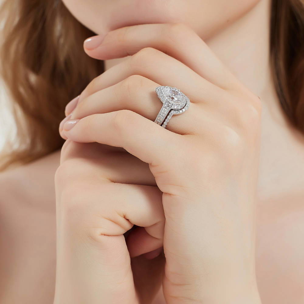 Model wearing Halo Milgrain Pear CZ Ring Set in Sterling Silver