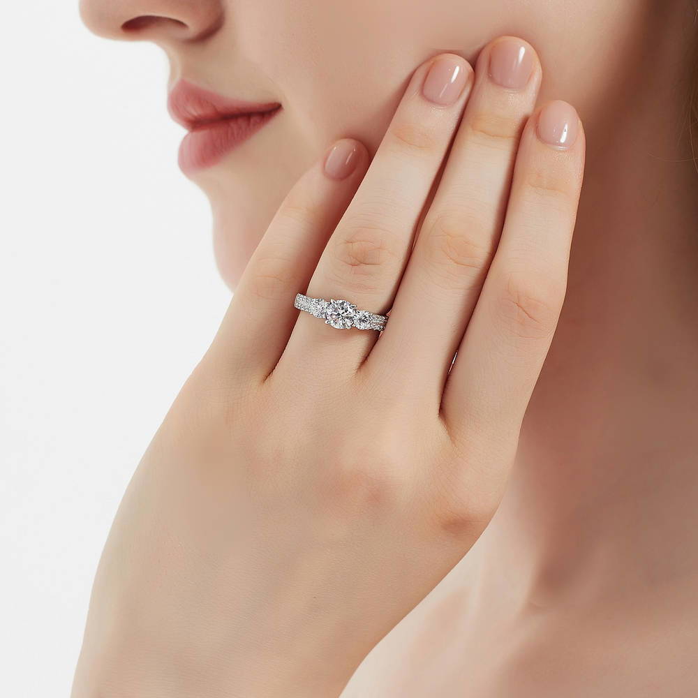 Model wearing 3-Stone Round CZ Ring in Sterling Silver