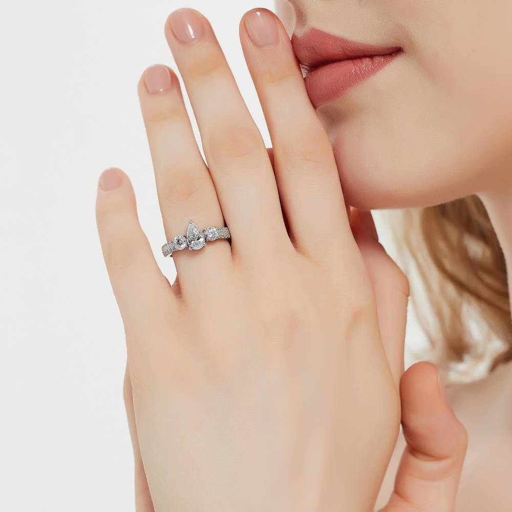 Model wearing 3-Stone Pear CZ Ring in Sterling Silver