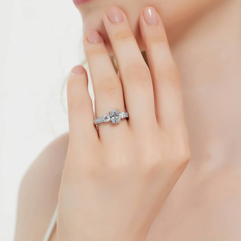 Model wearing 3-Stone Oval CZ Ring in Sterling Silver