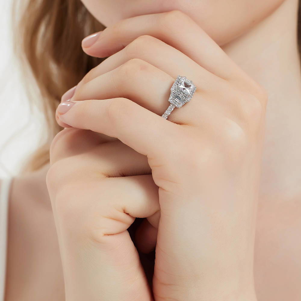 Model wearing Halo 3-Stone Princess CZ Ring in Sterling Silver