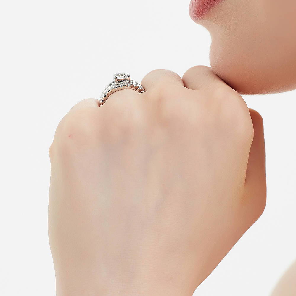 Model wearing Solitaire Woven 1.25ct Round CZ Ring Set in Sterling Silver, 7 of 17