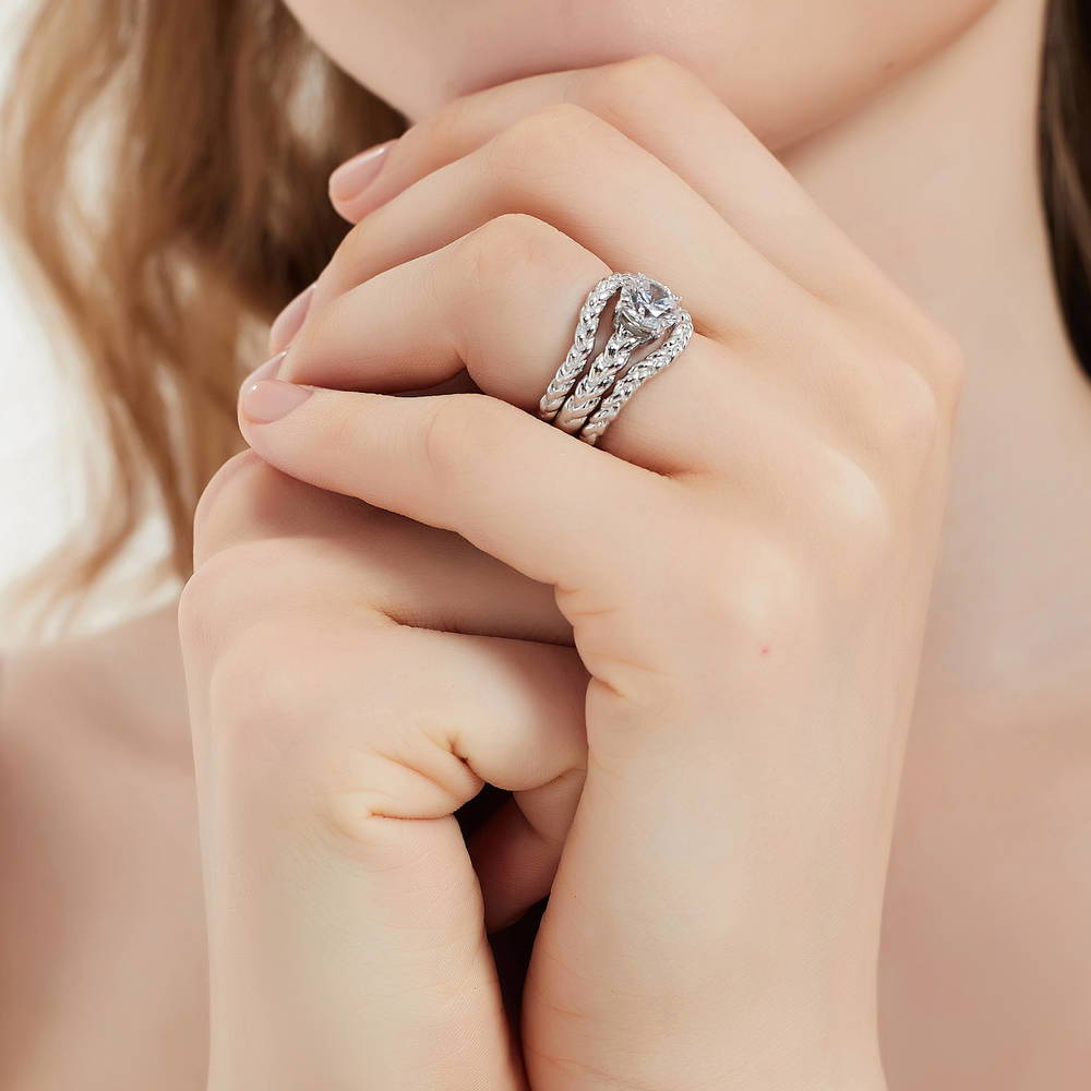 Model wearing Solitaire Woven 1.25ct Round CZ Ring Set in Sterling Silver