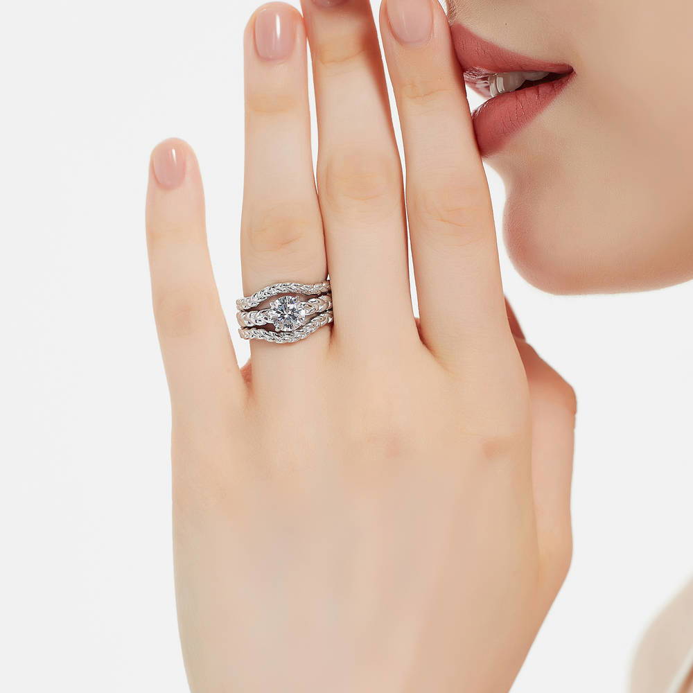 Model wearing Solitaire Woven 1.25ct Round CZ Ring Set in Sterling Silver