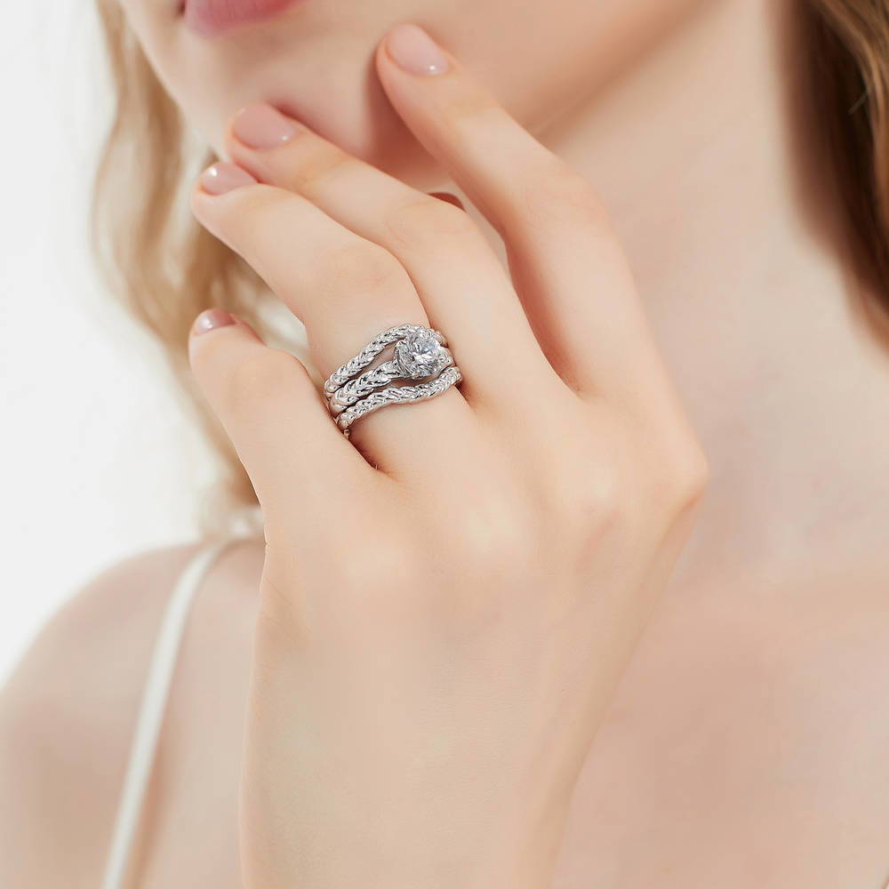 Model wearing Solitaire Woven 1.25ct Round CZ Ring Set in Sterling Silver