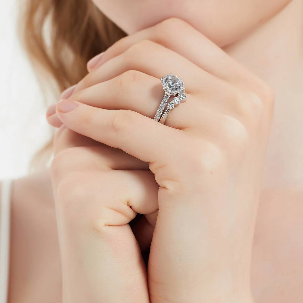 Model wearing 5-Stone Solitaire CZ Ring Set in Sterling Silver