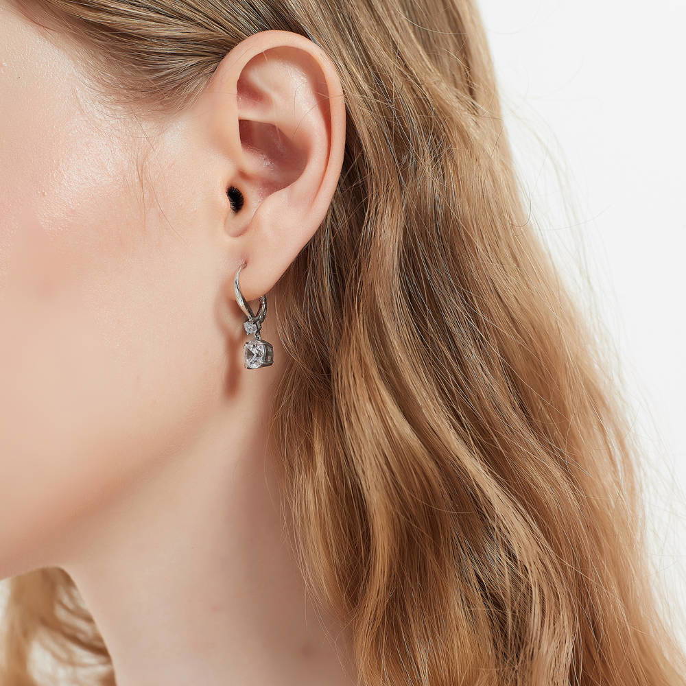 Model wearing Solitaire 2.5ct Round CZ Leverback Dangle Earrings in Sterling Silver