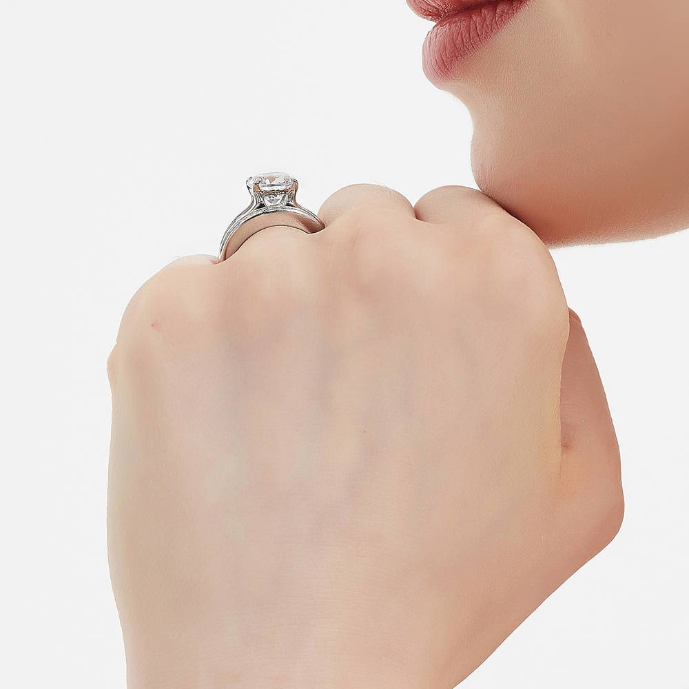 Model wearing Solitaire 2.7ct Round CZ Ring Set in Sterling Silver