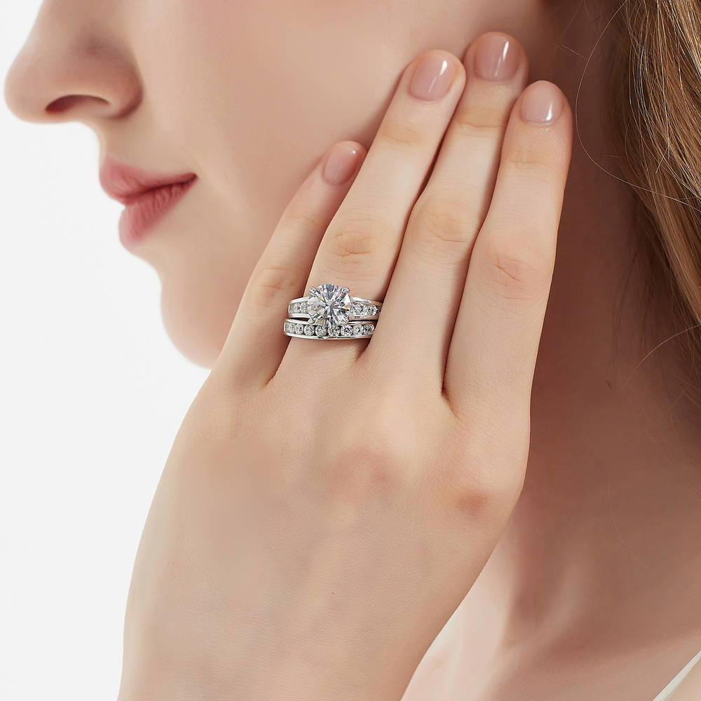 Model wearing Solitaire 2.7ct Round CZ Ring Set in Sterling Silver