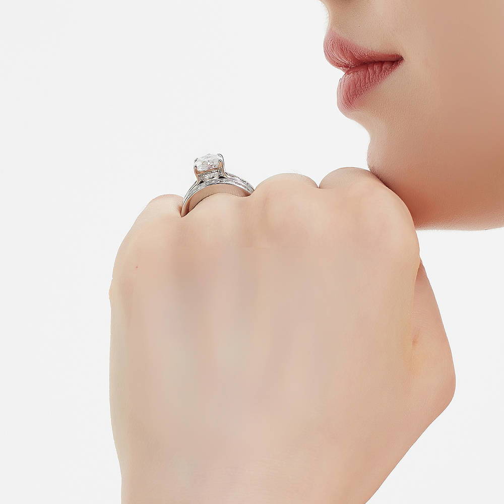 Model wearing Solitaire 3ct Pear CZ Ring Set in Sterling Silver