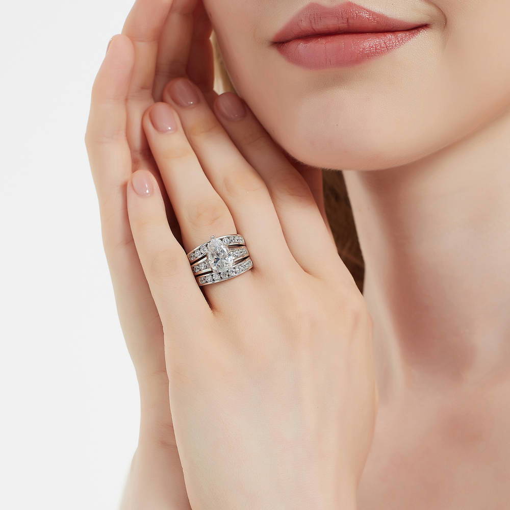 Model wearing Solitaire 3ct Pear CZ Ring Set in Sterling Silver