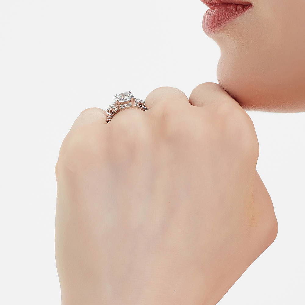 Model wearing 3-Stone Woven Round CZ Ring in Sterling Silver