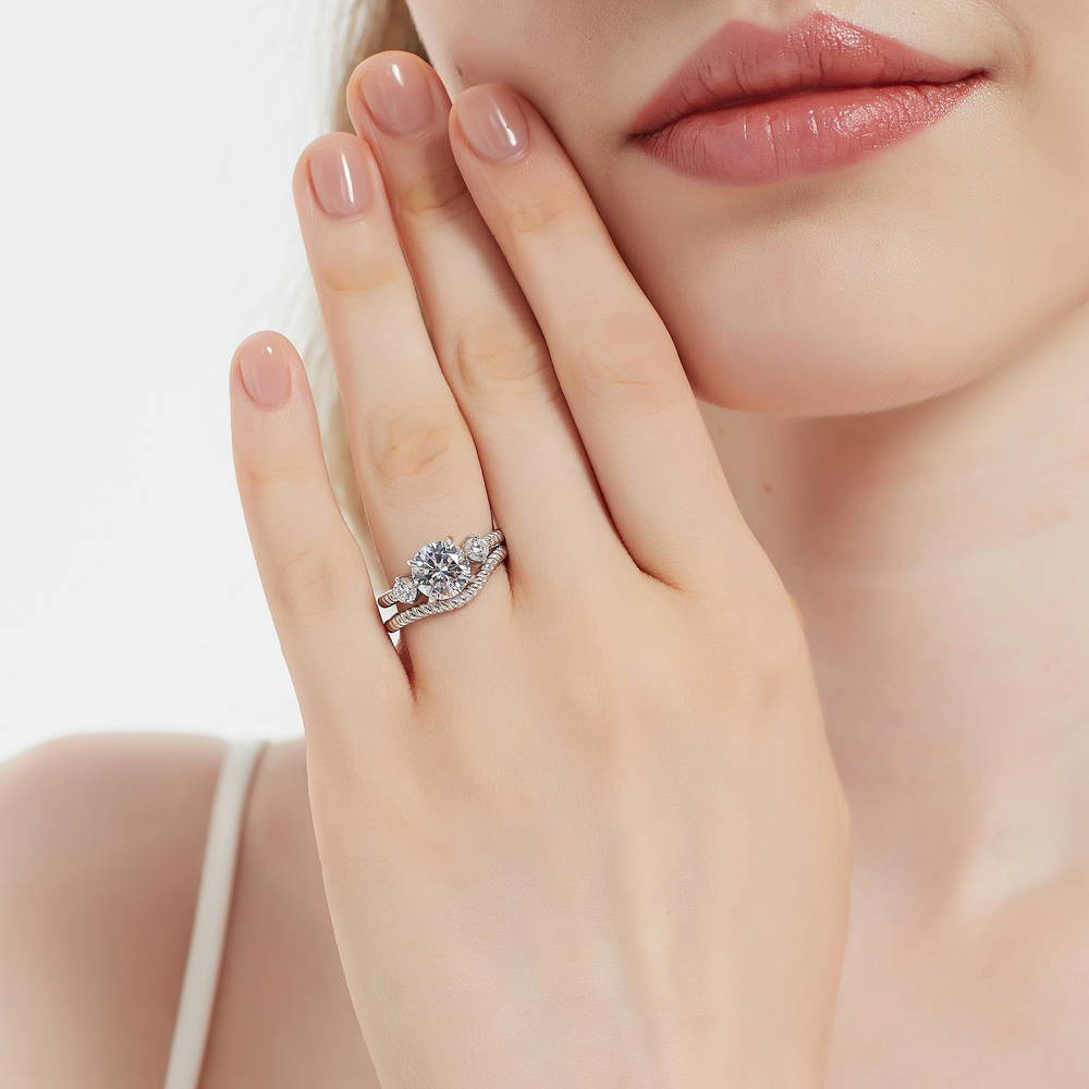 Model wearing 3-Stone Woven Round CZ Ring Set in Sterling Silver