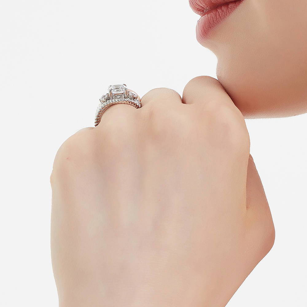 Model wearing 3-Stone Woven Round CZ Ring Set in Sterling Silver