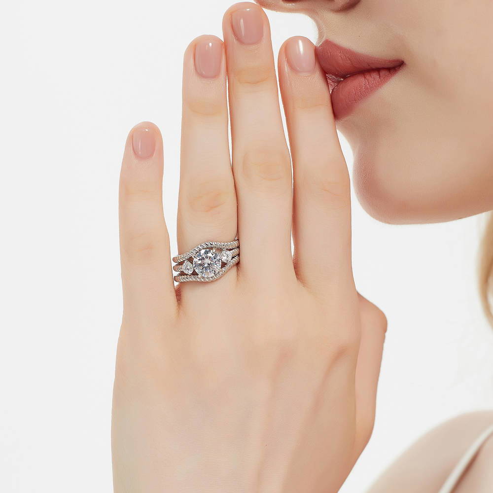 Model wearing 3-Stone Woven Round CZ Ring Set in Sterling Silver