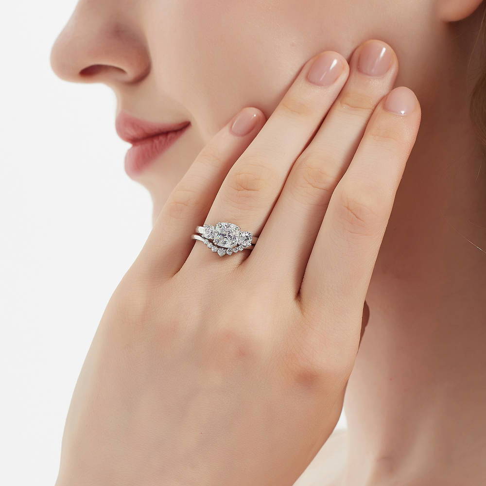 Model wearing 3-Stone 7-Stone Cushion CZ Ring Set in Sterling Silver