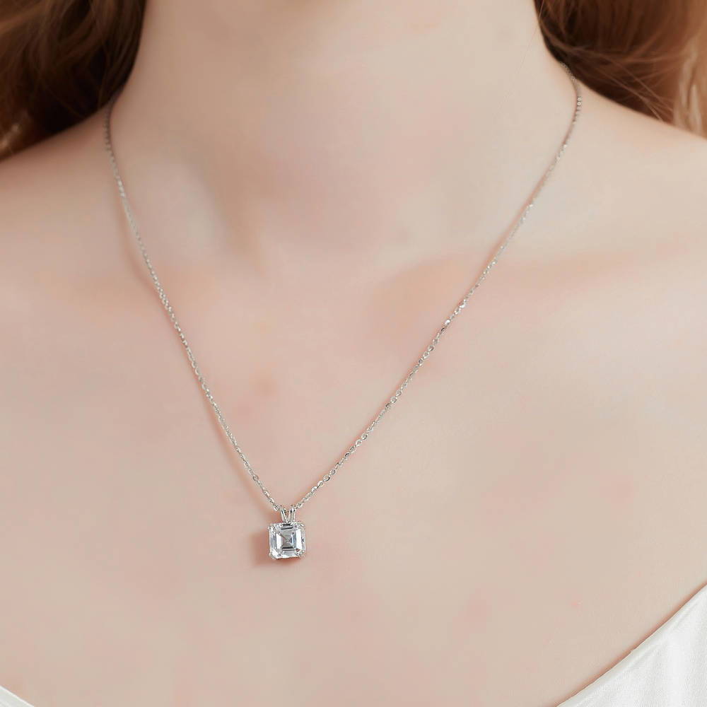 Model wearing Solitaire 6ct Asscher CZ Pendant Necklace in Sterling Silver, 2 Piece, 2 of 15