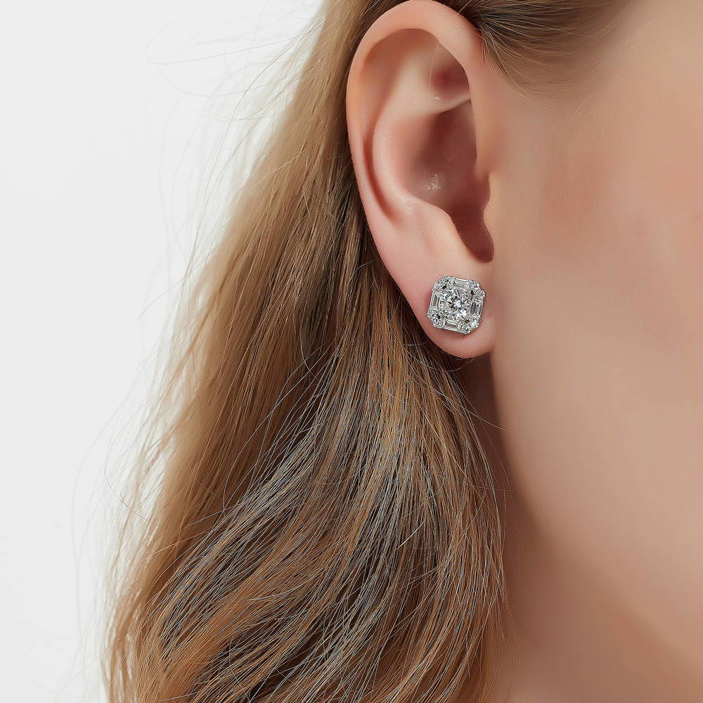 Model wearing Halo Art Deco Round CZ Stud Earrings in Sterling Silver