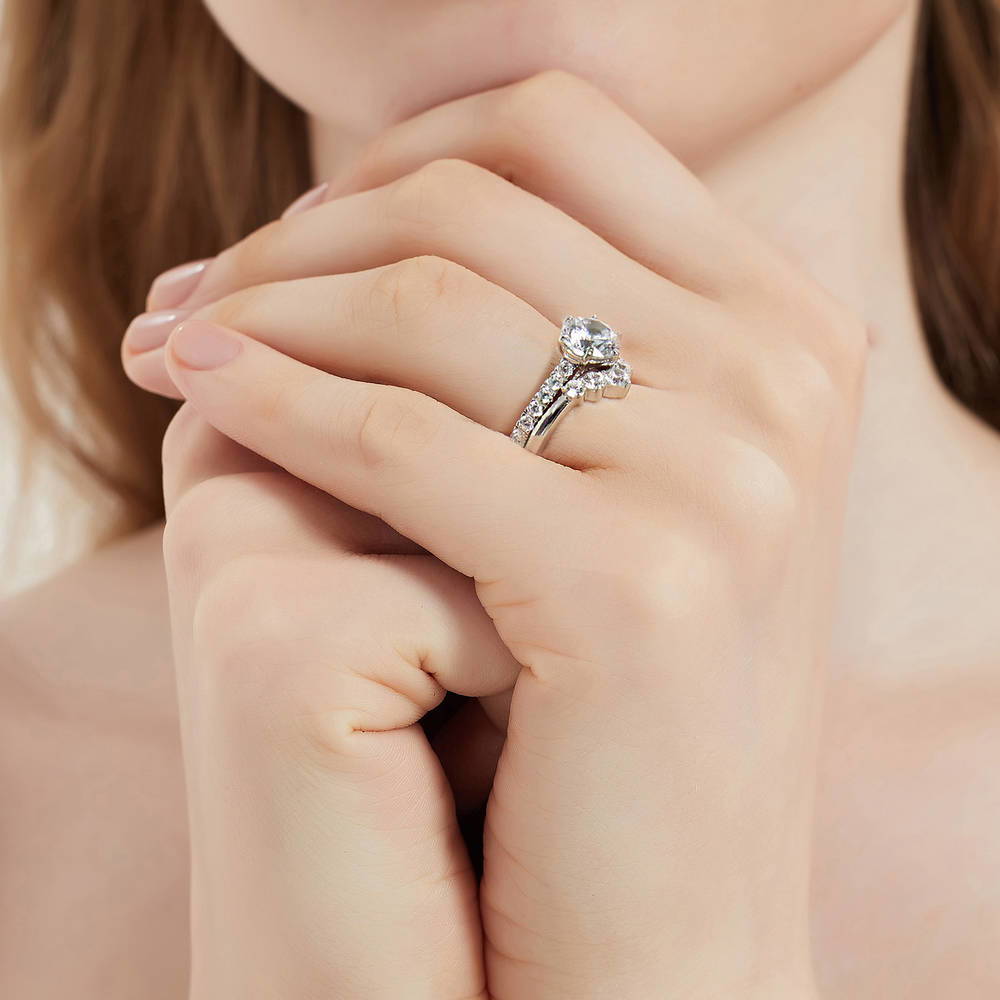 Model wearing 5-Stone Solitaire CZ Ring Set in Sterling Silver